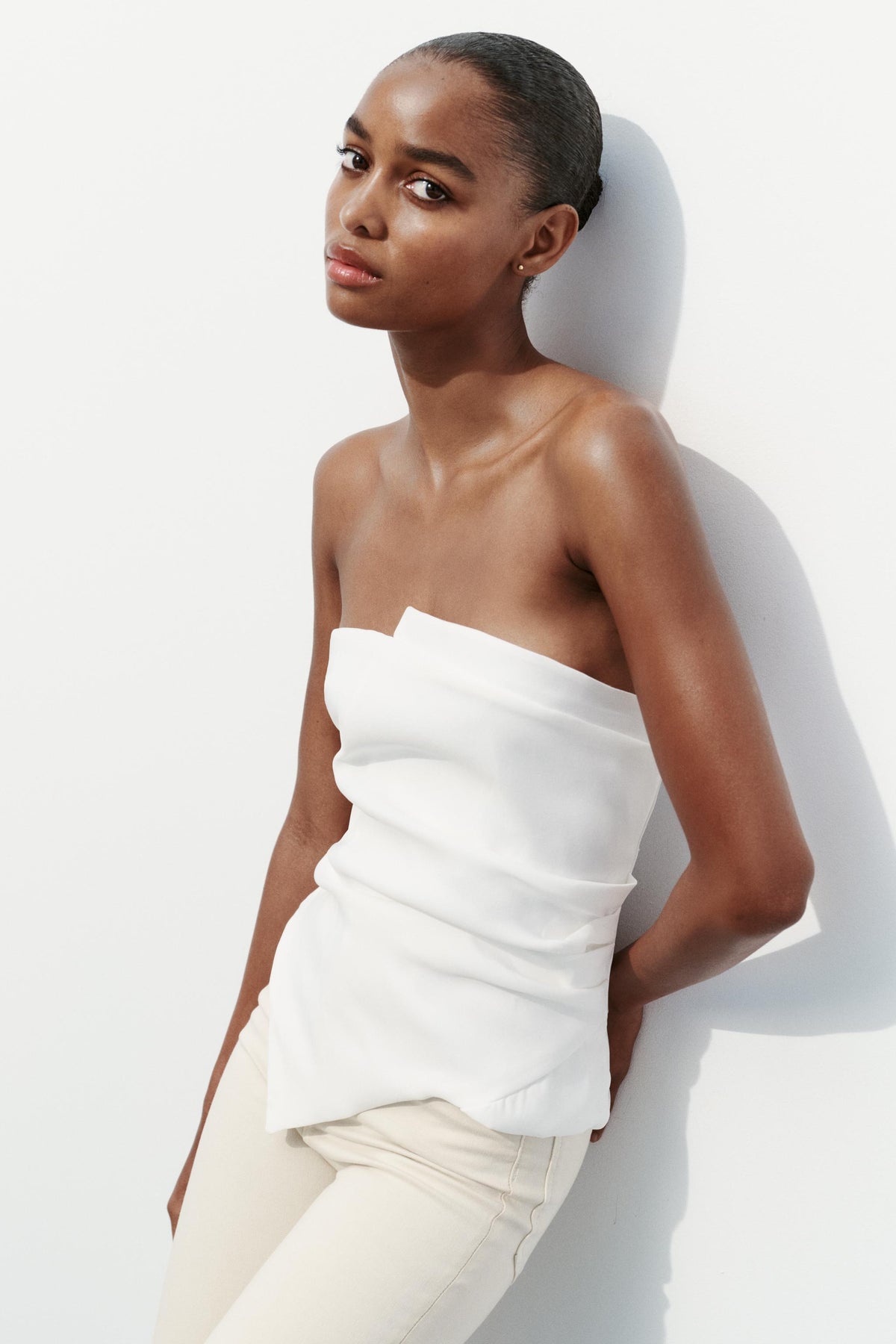 Chic Asymmetry – Strapless Pleated Crop Top | Vivezzo